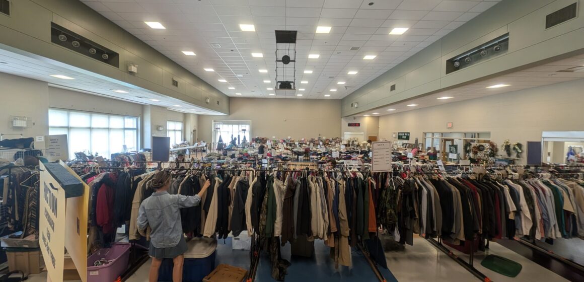 woman browsing clothing racks