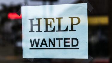 Help wanted sign in a window